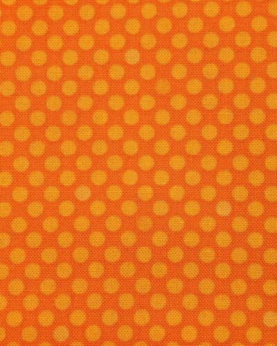 Orange med gule prikker