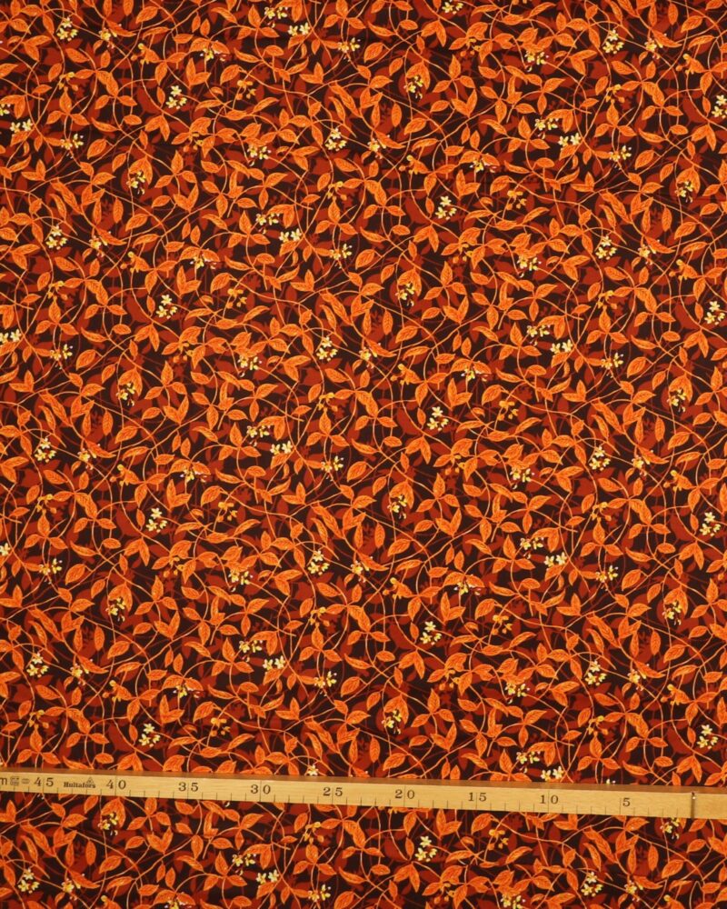 Snerler og blade i orange nuancer - Patchwork - Free Spirit