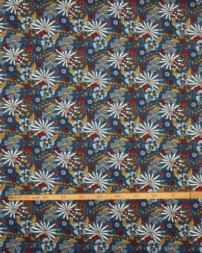 Blomster på jeansblå bund - Jersey