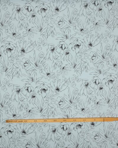 Støvet blå med tegnet blomst - Sandvasket viskose/polyester