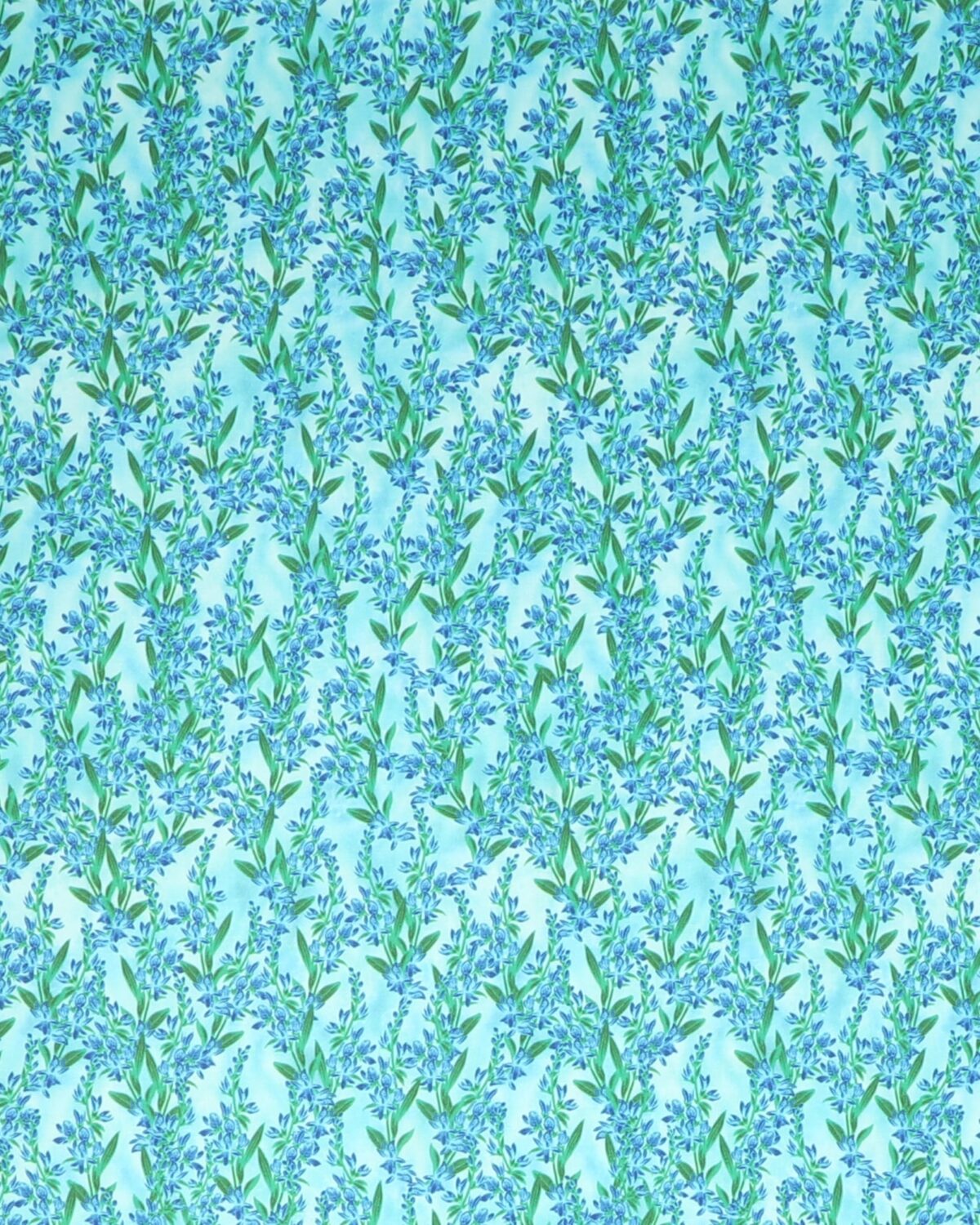 Blå blomster på bund af turkise farver - Patchwork