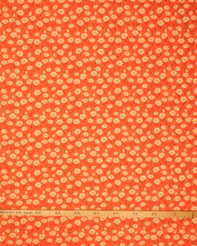 Ferskenfarver blomster på orange - Patchwork