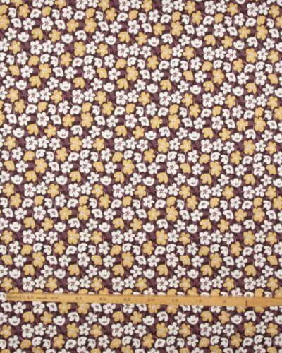 Blomster med glimmer, aubergine/hvid/guld - Jersey