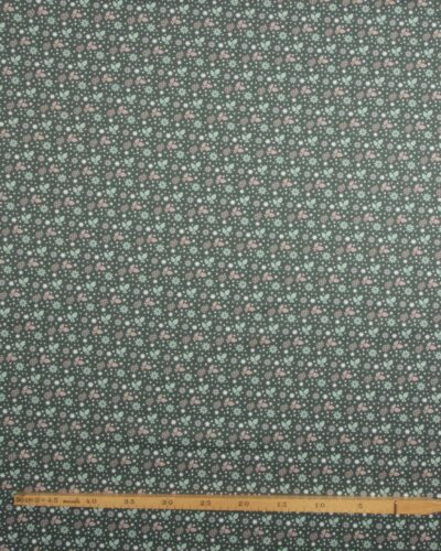 Kristtjørn og stjerner på grøn bund - Bomuld