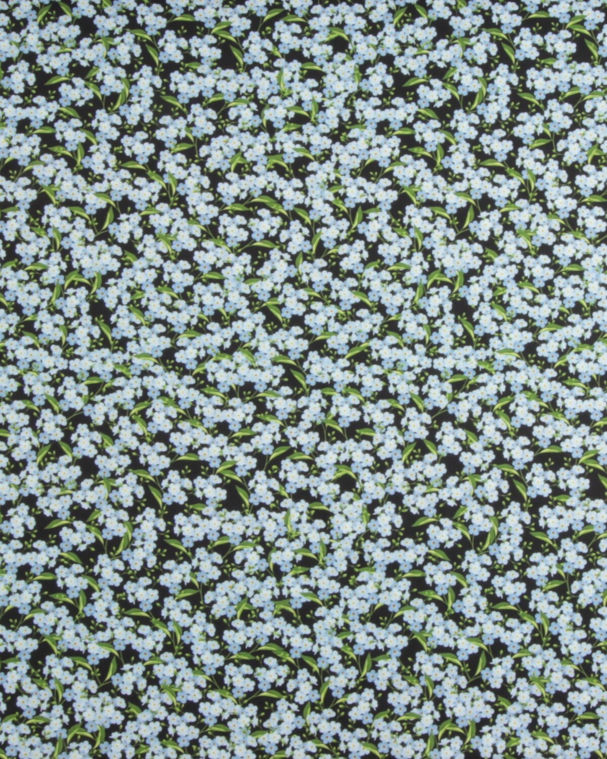 Blå blomster på sort - Patchwork