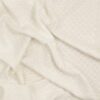 Offwhite med lille broderet blomst - Double Gauze/musselin stof