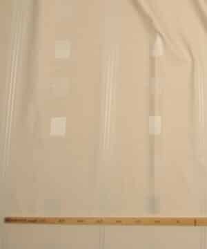 Lys beige med blanke felter og striber