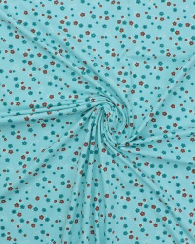 Små blomster på lyseblå - Jersey 7 Små blomster på lyseblå - Jersey