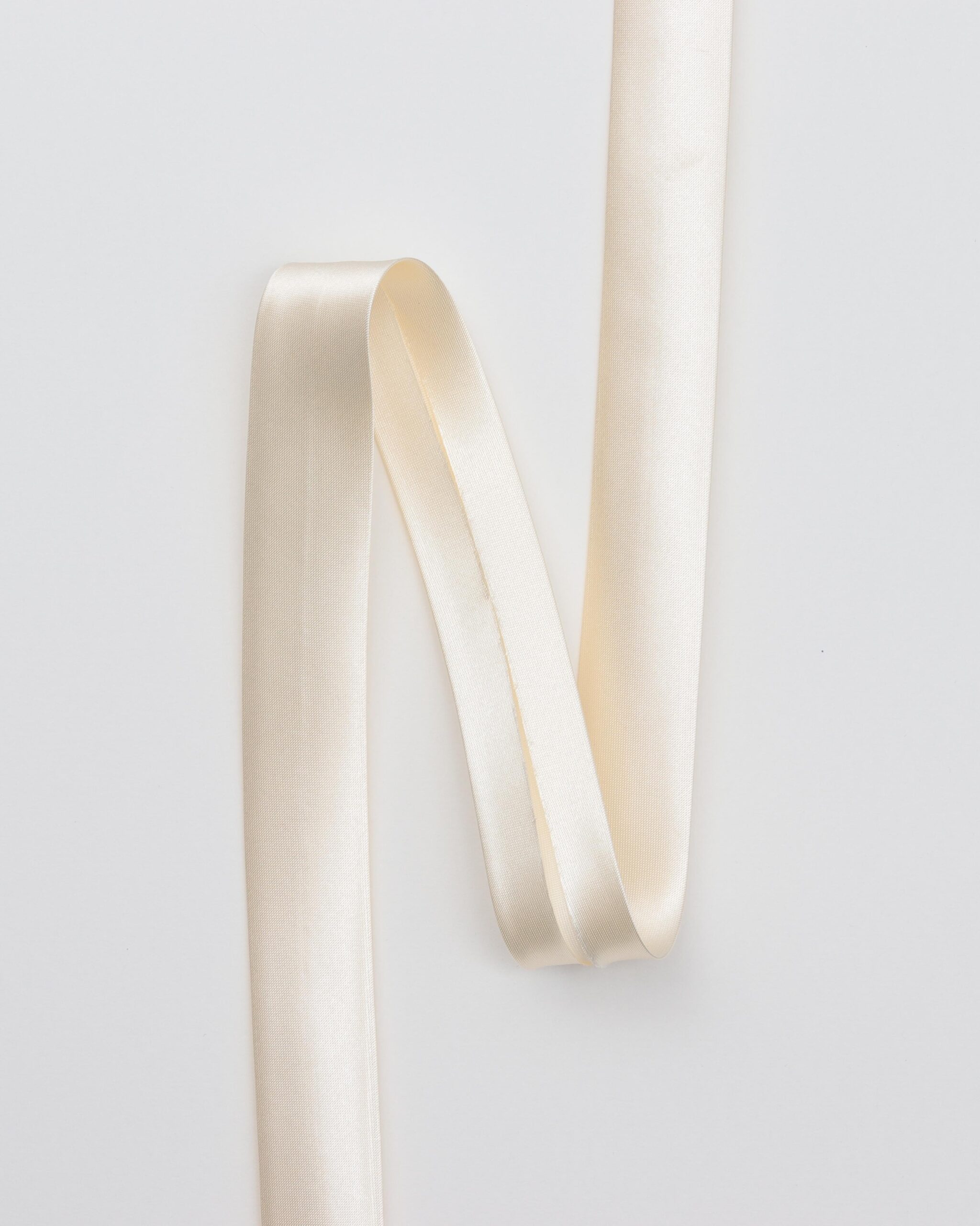 Ensfarvet satin skråbånd 20 mm - Polyester