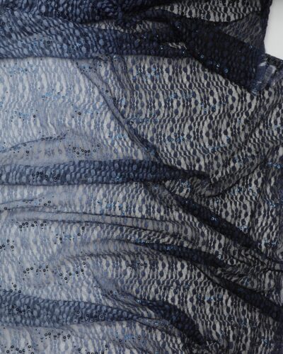 Blå/lyseblå blonde med folietrykte små cirkler i mørkeblå - Polyester