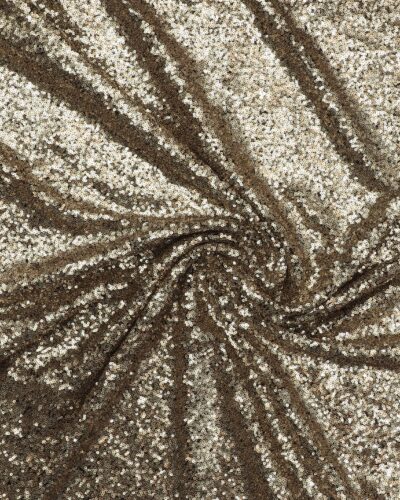 Små guldpalietter på tyl med stræk