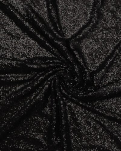 Små sorte palietter på tyl med stræk