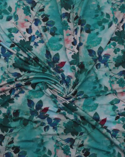 Blomster og blade i blå og petrolfarvet farver - Viskose jersey