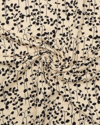 Snerler og blade i sort på cremefarvet bund - Twillvævet Viskose (Ecovero)