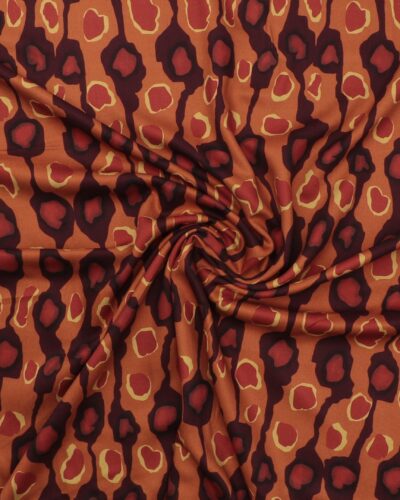 Mønster i rust og brændt orange - Twillvævet viskose