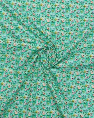 Små søde dyr på grøn bund - Bomuld