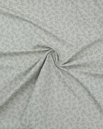 Offwhite med grønt bladmønster - Gardinstof