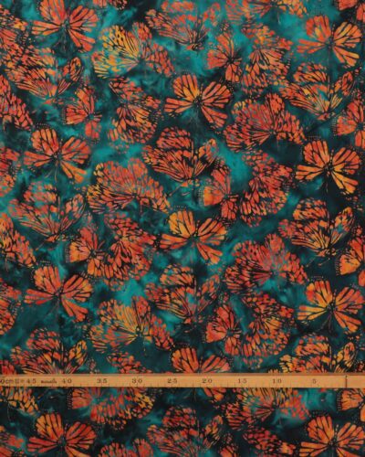 Alternative view of Orangerøde sommerfugle på petrolgrøn - Bali