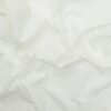 Offwhite med broderet mønster og tungekant - Broderie Anglaise